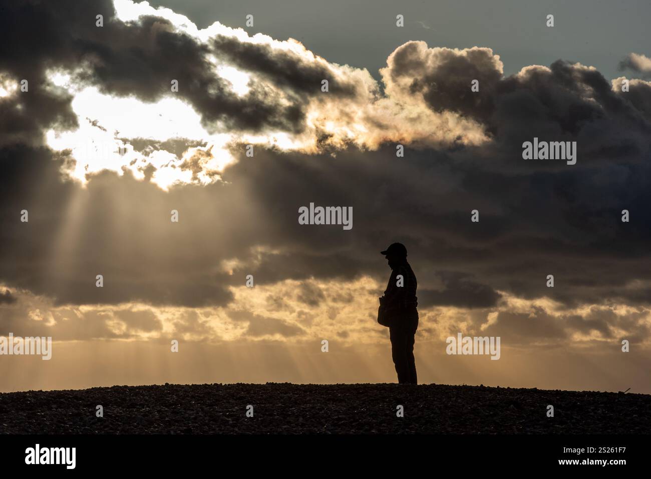 Brighton, January 6th 2025 A solitary man watches the sunset on