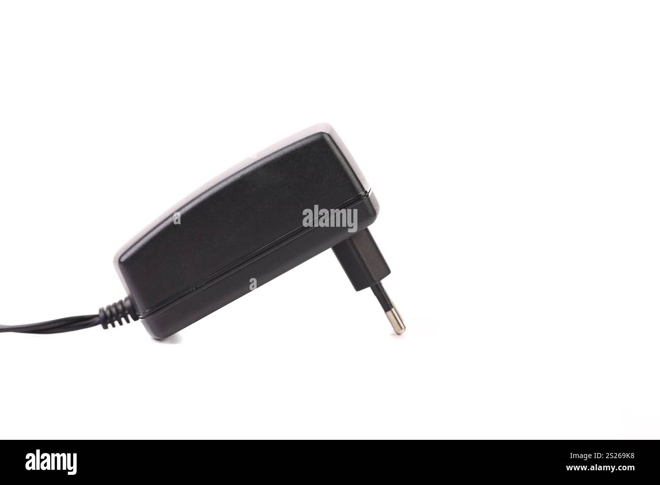 Power Adapter Background Electric power adapter. Close up. White background Stock Photo - Alamy