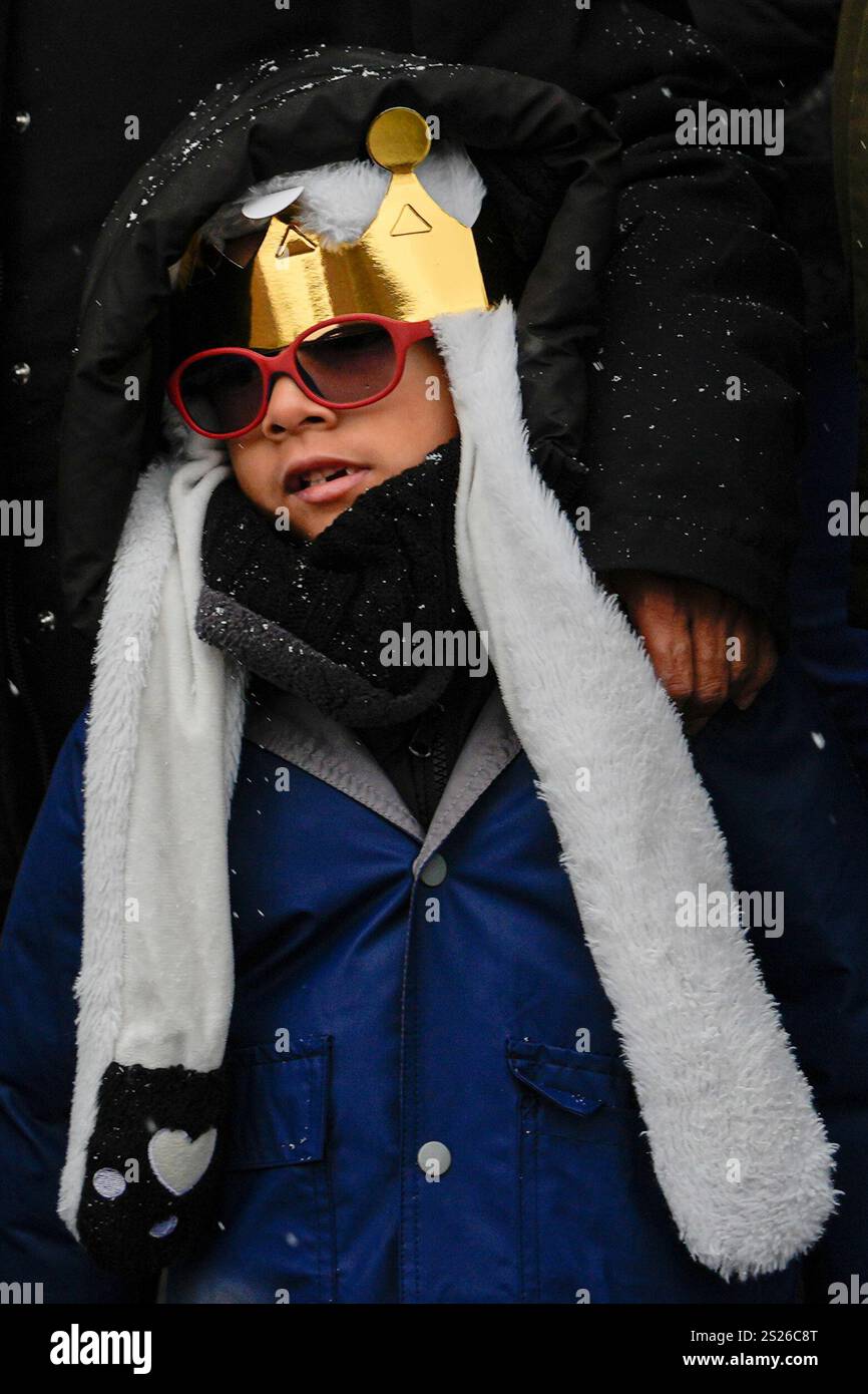A boy watches El Museo del Barrio's 47th annual Three Kings Day parade