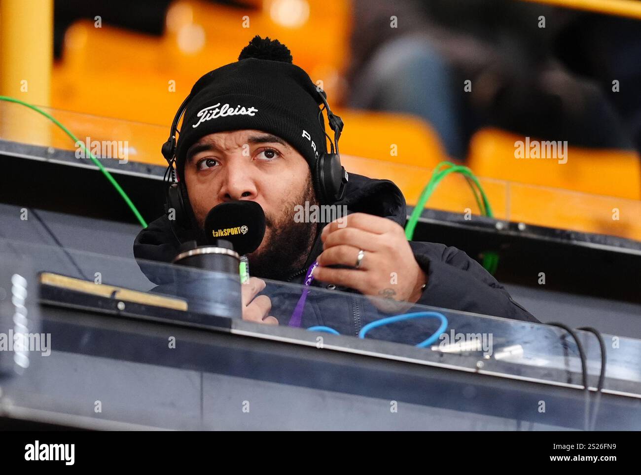 Troy Deeney working for TalkSport before the Premier League match at