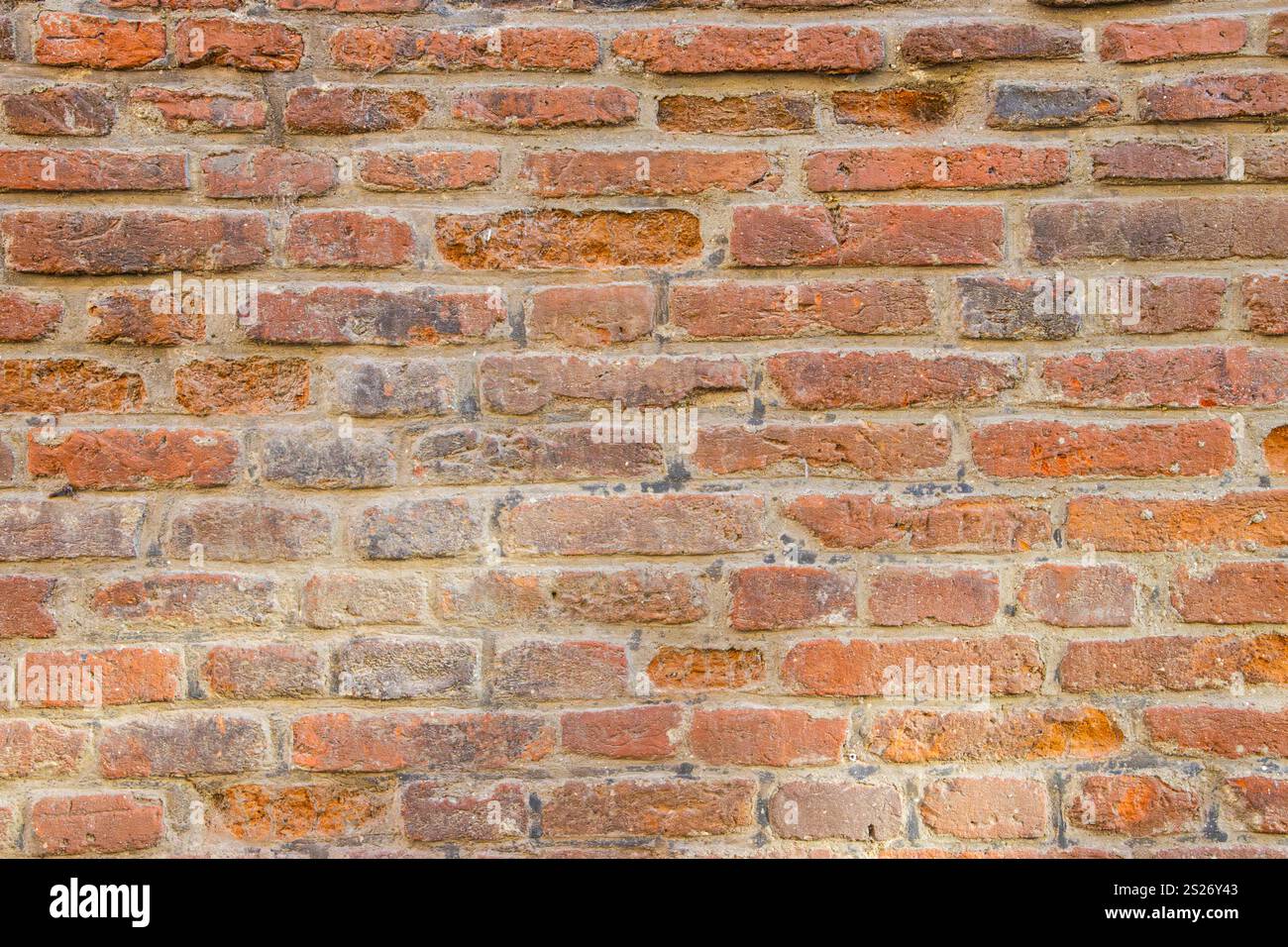 Aged brick wall background. Old brick wall texture Stock Photo