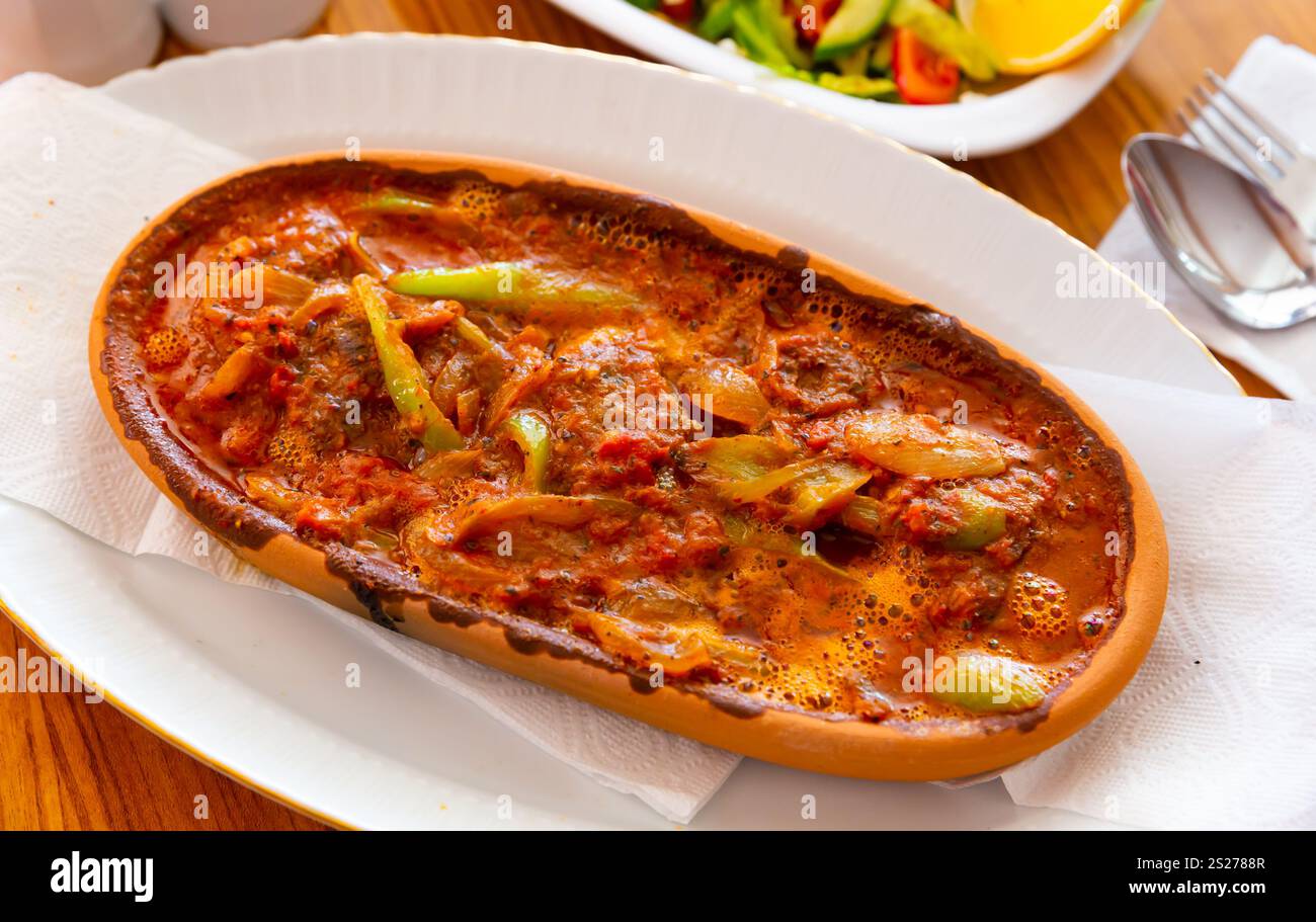 Izmir kofte, turkish dish of spicy meatballs Stock Photo - Alamy