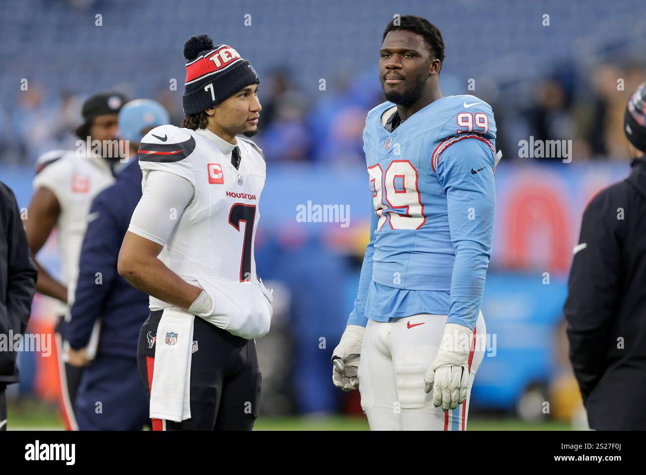 Houston Texans quarterback C.J. Stroud (7) talks with Tennessee Titans ...