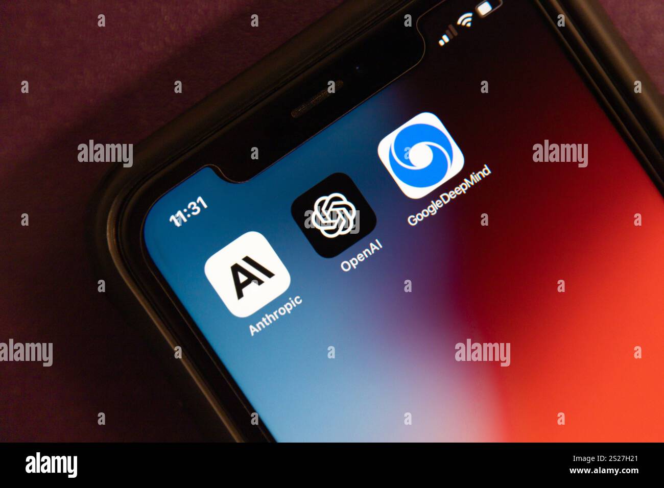 Anthropic, OpenAI and Google DeepMind icons are displayed on an iPhone screen. A concept image of three innovators symbolizing the future of AI Stock Photo