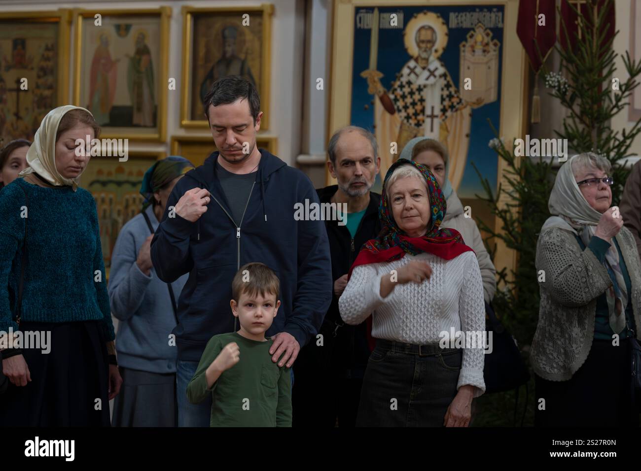 The faithful attend an Orthodox Christmas service at the Church of the