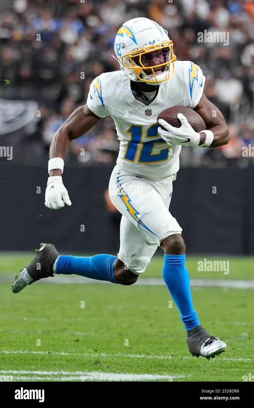 Los Angeles Chargers wide receiver Derius Davis (12) runs with the ...
