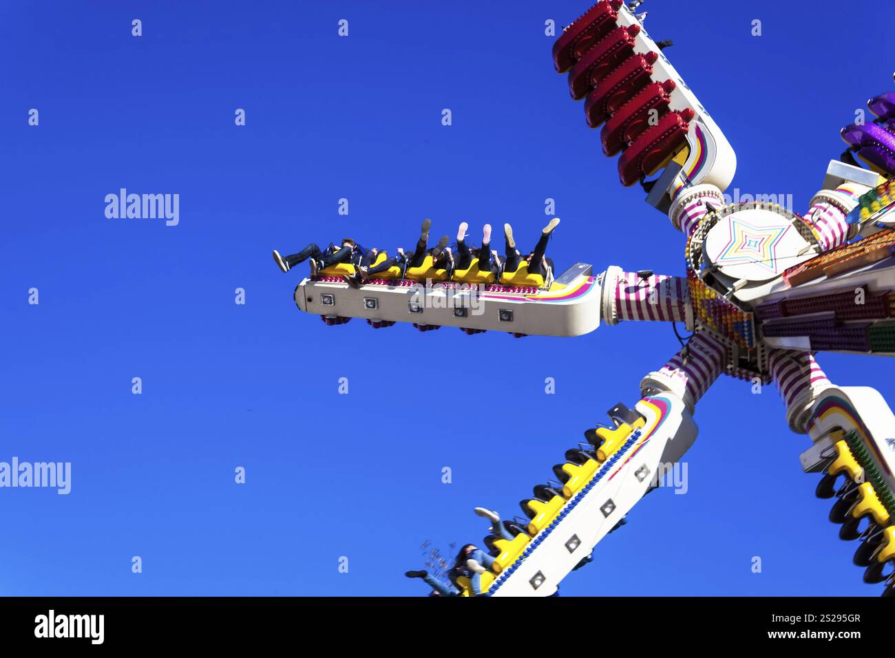 Rides at a folk festival. Atmosphere and thrills Stock Photo - Alamy