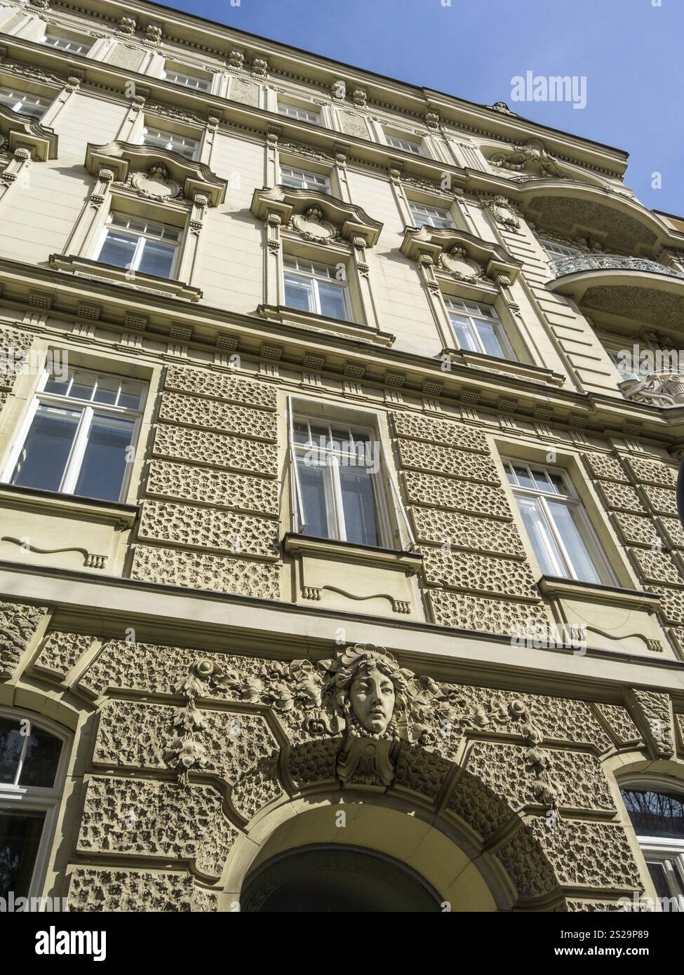 A figure decorates a beautiful house in Vienna, Austria. Austria Stock Photo