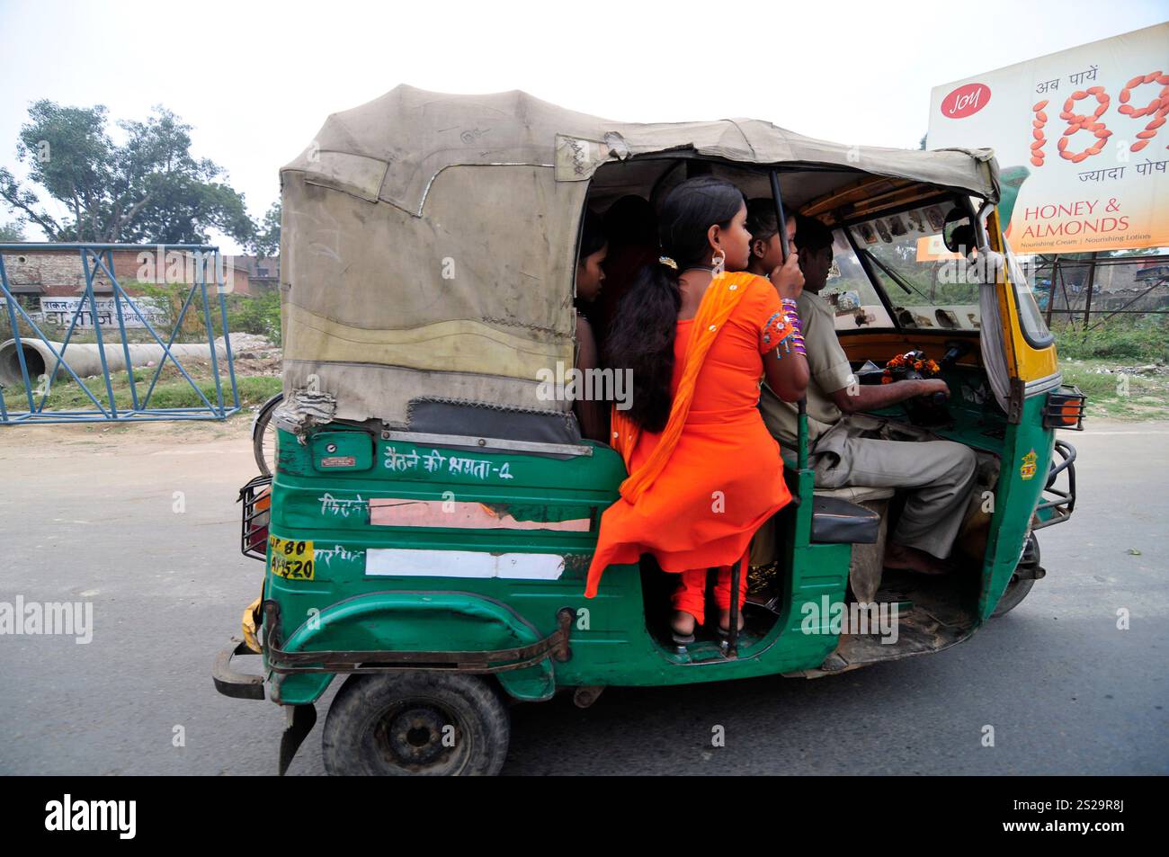An Auto Rickshaw rushing through the streets of Agra, India Stock Photo ...