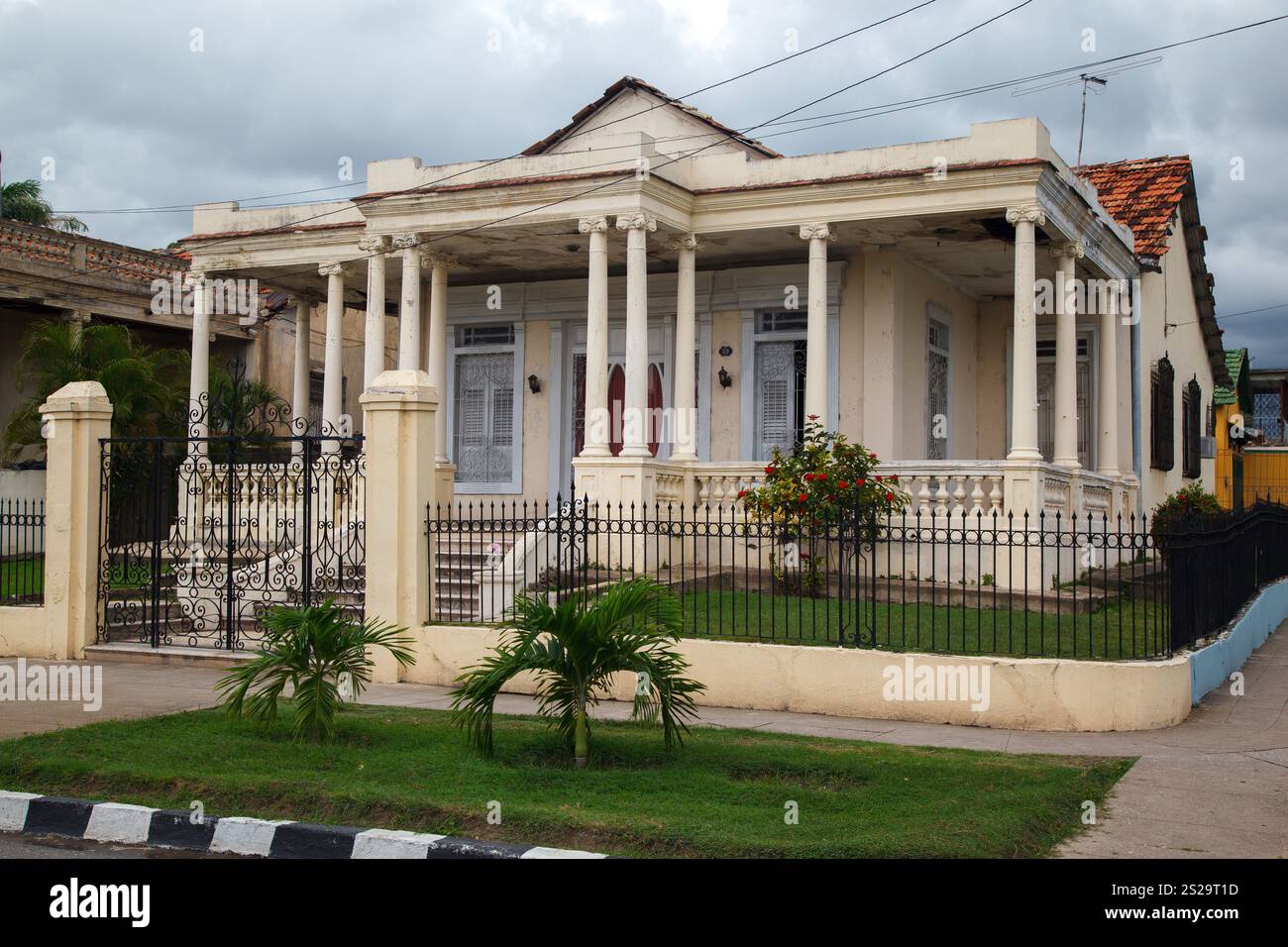 The typical colonial ornate buildings with corinthian columns in ...