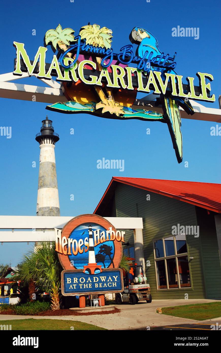 A large parrot sits on the sign to Jimmy Buffet’s Margaritaville, a bar and restaurant themed on the singer’s famous song Stock Photo