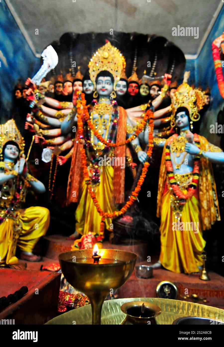 Vishva Rupa Arjuna bows to the Vishvarupa of Vishnu-Krishna. Photo taken in a small ...