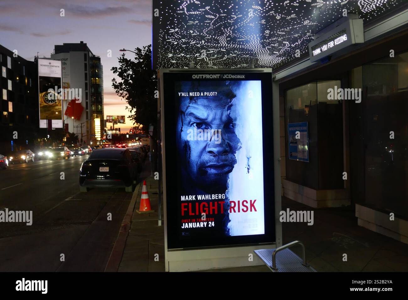 Los Angeles, California, USA 6th January 2025 Mark Wahlberg Flight Risk Bus Stop/Billboard on Sunset Blvd on January 6, 2025 in Los Angeles, California, USA. Photo by Barry King/Alamy Stock Photo Stock Photo