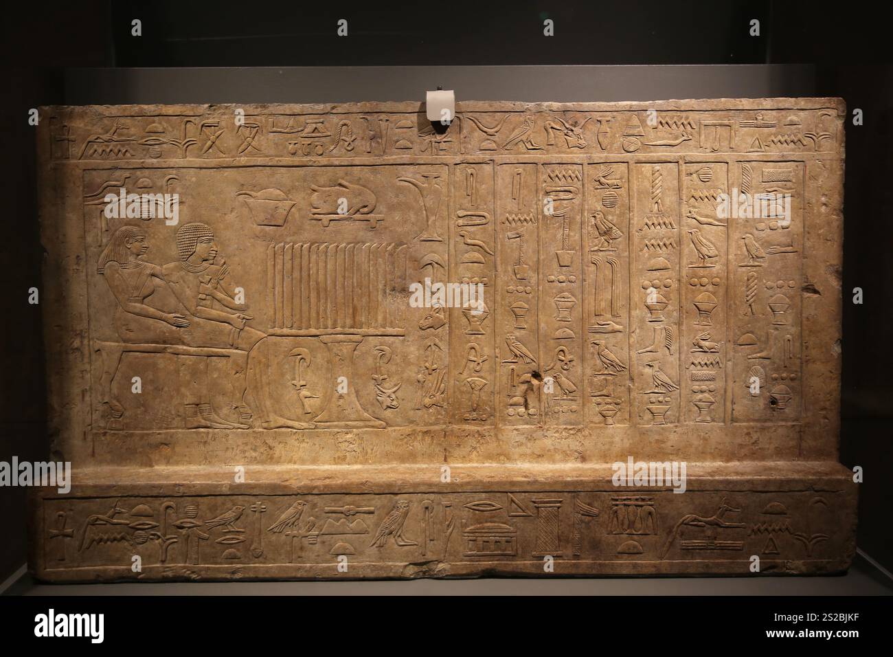 Stela of the courtiers Nyankhinpu and Djefes. Limestone. Old Kingdom, 6th Dynasty (2305-2118 BCE). Gebelien. Egyptian Museum of Turin. Italy. Stock Photo