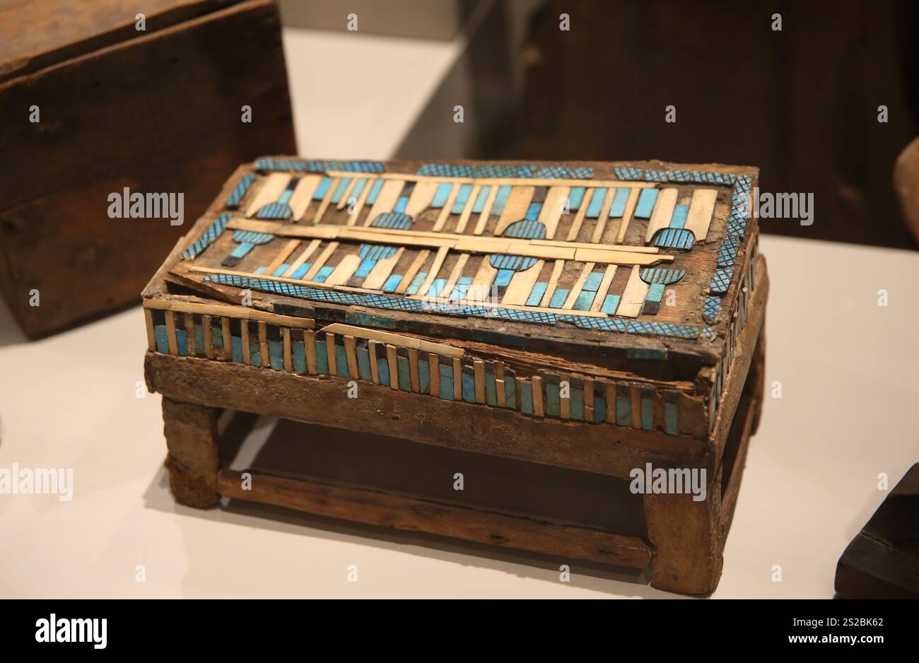 Small wooden casket with bone and faience inlaid vegetal elements. Wood, faince, bone. Old Kingdom,, 5th Dynasty (2435-2305). Gebelein, mastaba of P Stock Photo