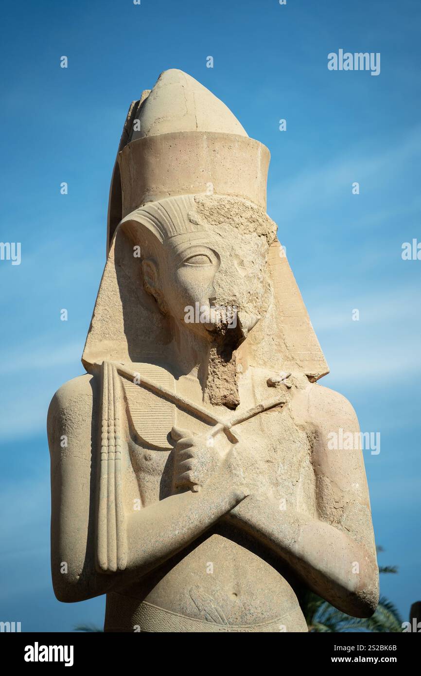 Egyptian ancient statue pharaoh in Karnak Stock Photo - Alamy