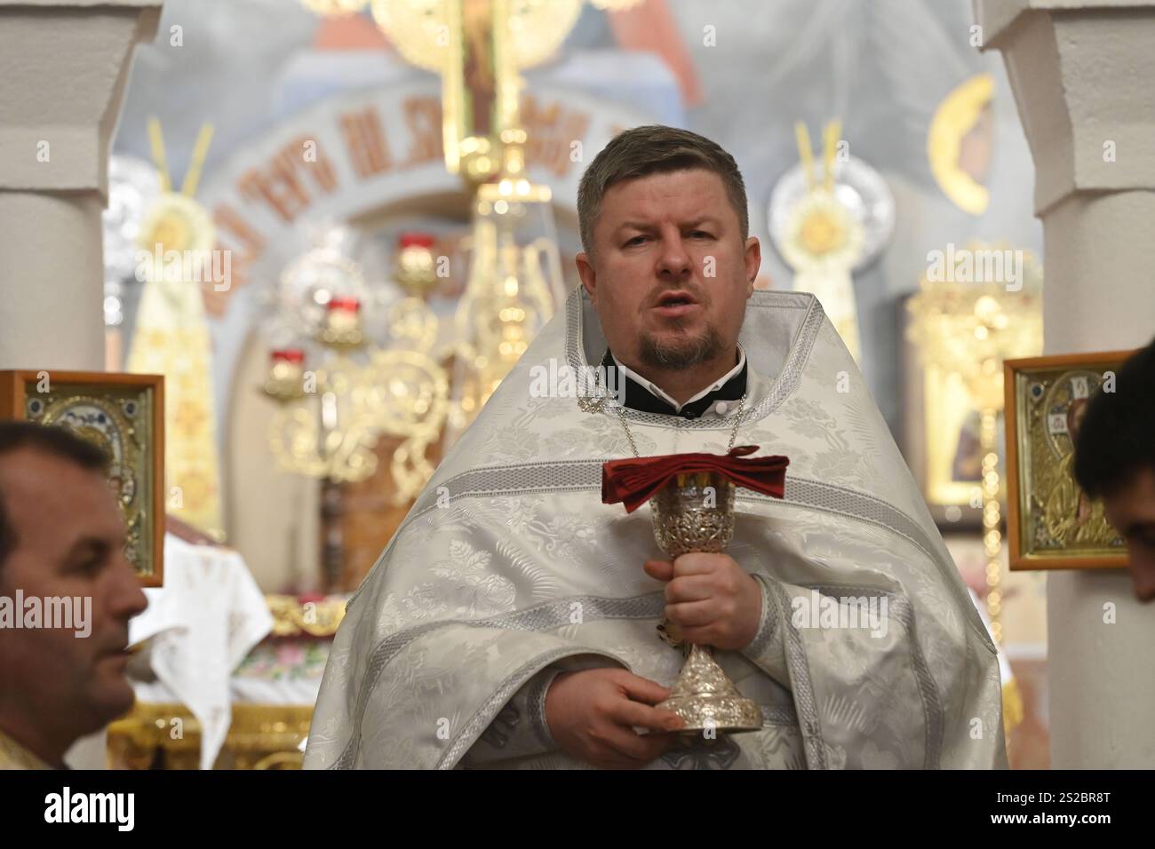Priest Alexij Kukhta celebrates Orthodox Christmas mass in Orthodox
