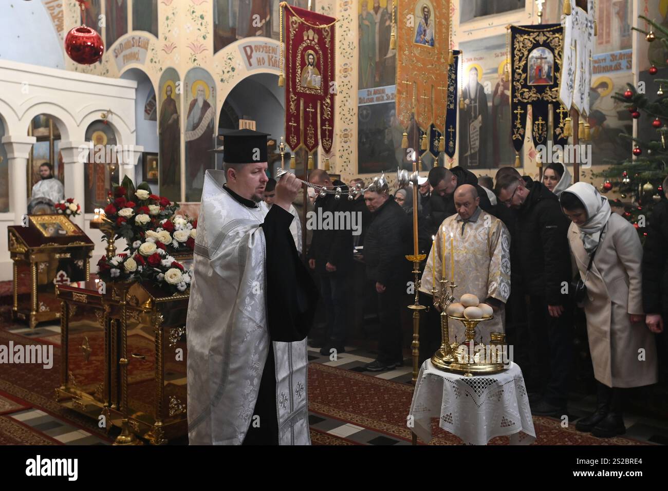 Priest Alexij Kukhta celebrates Orthodox Christmas mass in Orthodox
