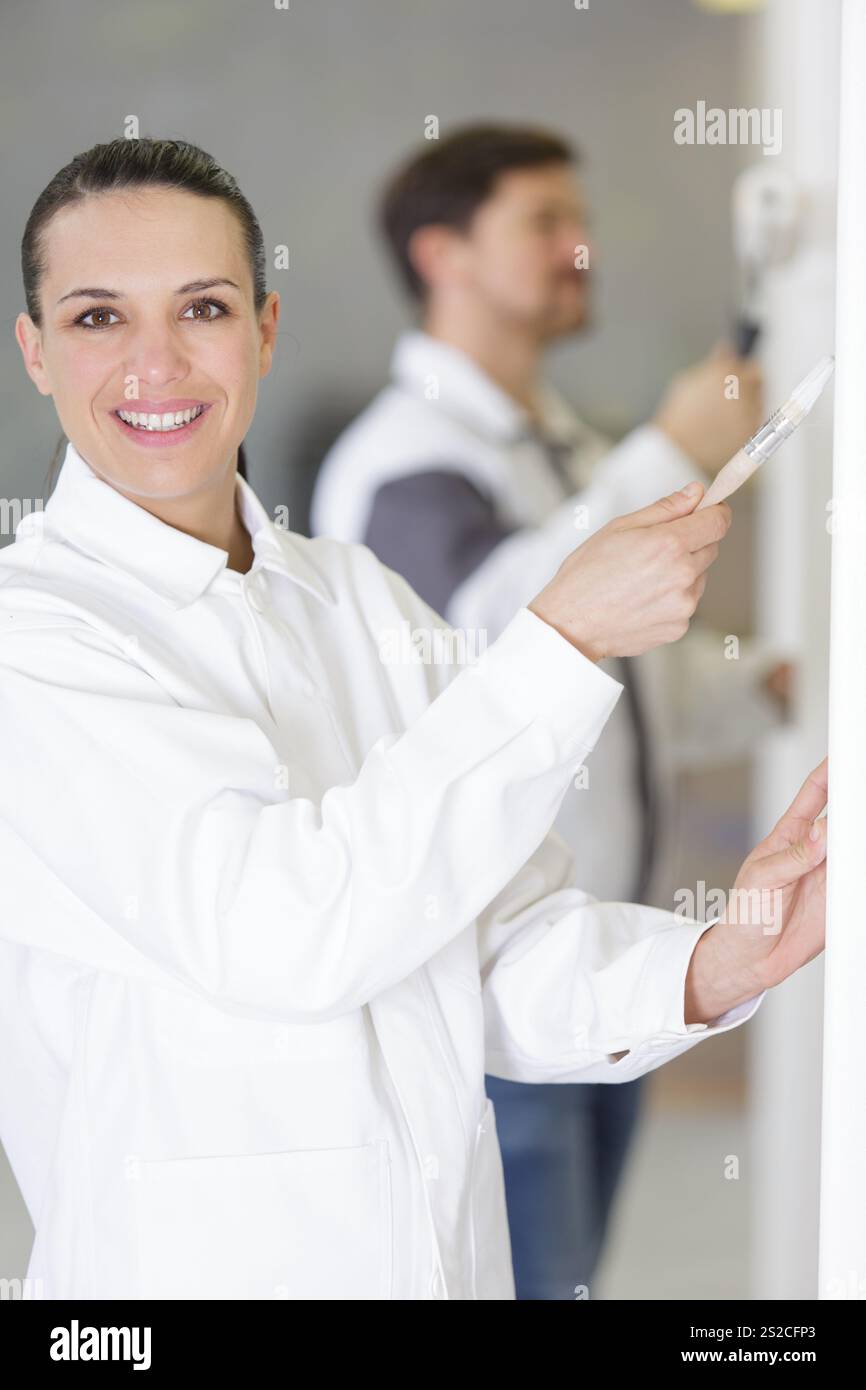 a happy professional painter at home Stock Photo