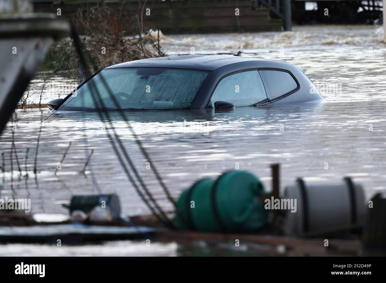 A car sits in the floods of the river Soar in Barrow Upon Soar, England
