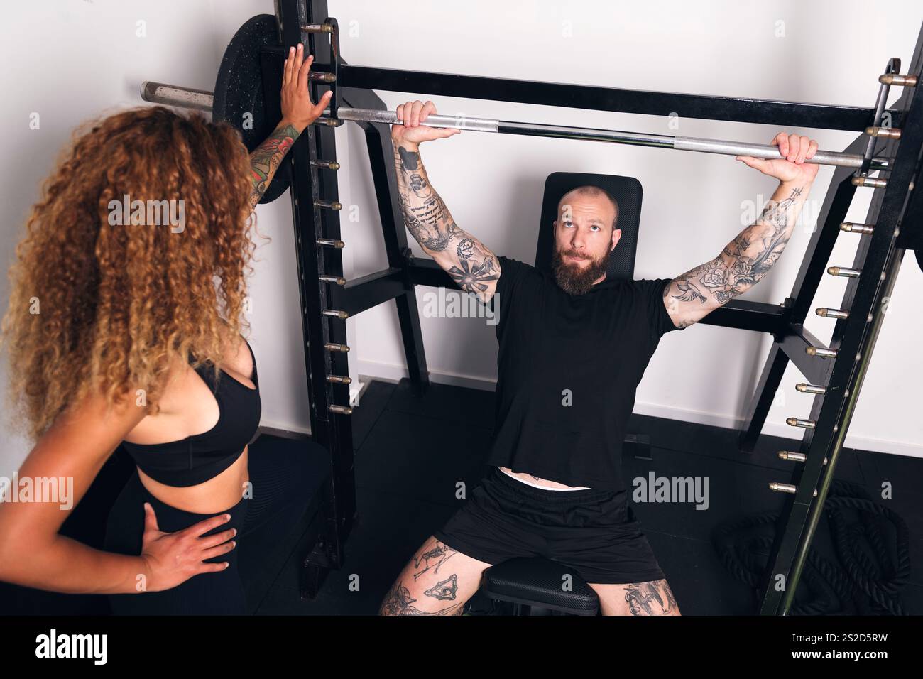 strong sportsman lifting barbell with heavy weight Stock Photo - Alamy