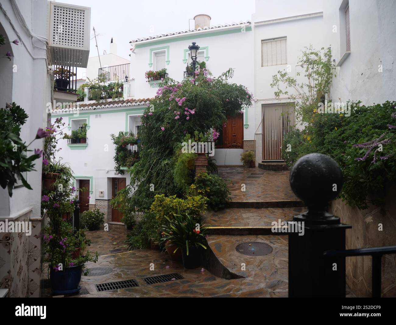 View into typical alley in Competa a white town in Andalusia Spain ...