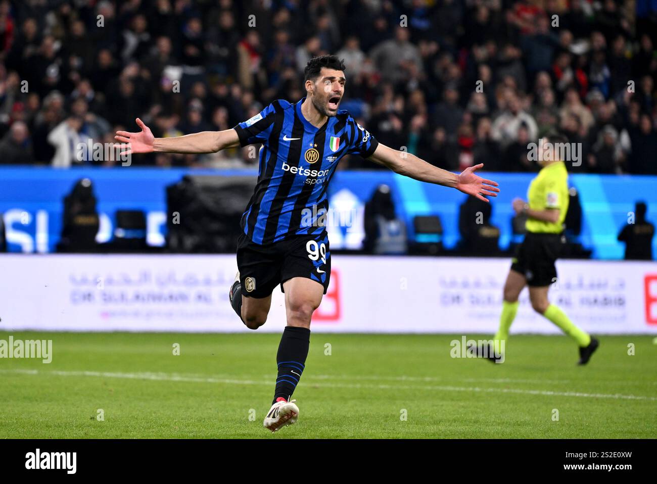 RIYADH, SAUDI ARABIA - JANUARY 6: Mehdi Taremi of FC Internazionale celebrates after scoring his team's second goal ,during the Italian Super Cup Final match between FC Internazionale and AC Milan at Al-Awwal Park Stadium on January 6, 2025 in Riyadh, Saudi Arabia. (Photo by MB Media) Stock Photo