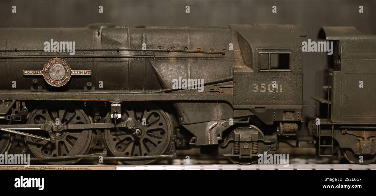 Detailed and weathered Hornby 00 gauge model of BR Merchant Navy Locomotive 35011, originally designed for the Southern Region. Sepia image Stock Photo