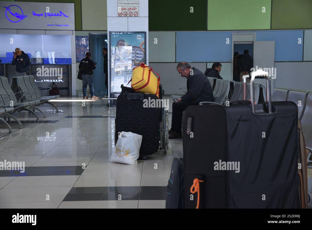 Damascus Syria 7th Jan 2025 - Damascus Syria 7th Jan 2025 A Passenger Waits For His Flight To The United Arab Emirates Uae At Damascus International Airport In Damascus Syria On Jan 7 2025 Damascus International Airport Resumed International Operations On Tuesday With Flights To The United Arab Emirates Uae And Qatar As The Interim Administration In Syria Continues To Bolster Ties With Gulf Countries Credit Monsef Memarixinhuaalamy Live News 2S2ER8J 