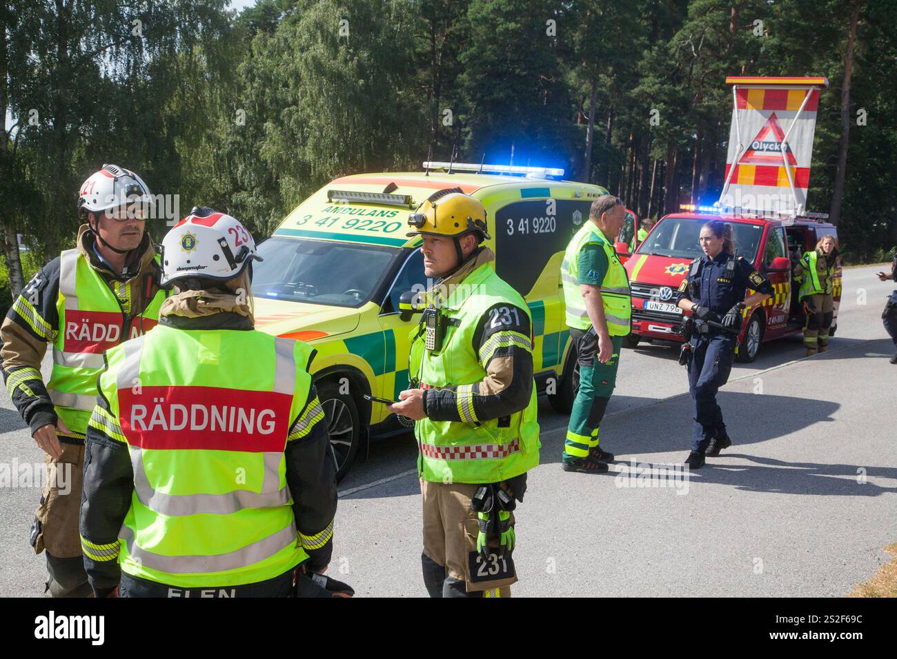 Traffic Sign Rescue AMBULANCE and rescue personnel in the evenit of a traffic accident ...