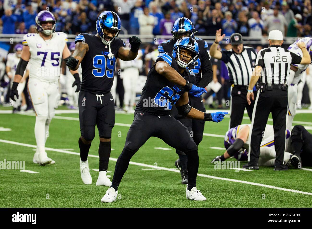 Detroit Lions linebacker AlQuadin Muhammad (69) celebrates against the