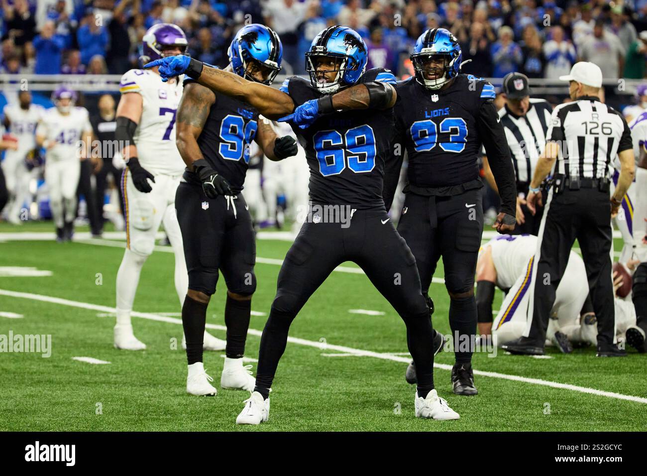 Detroit Lions linebacker AlQuadin Muhammad (69) celebrates against the