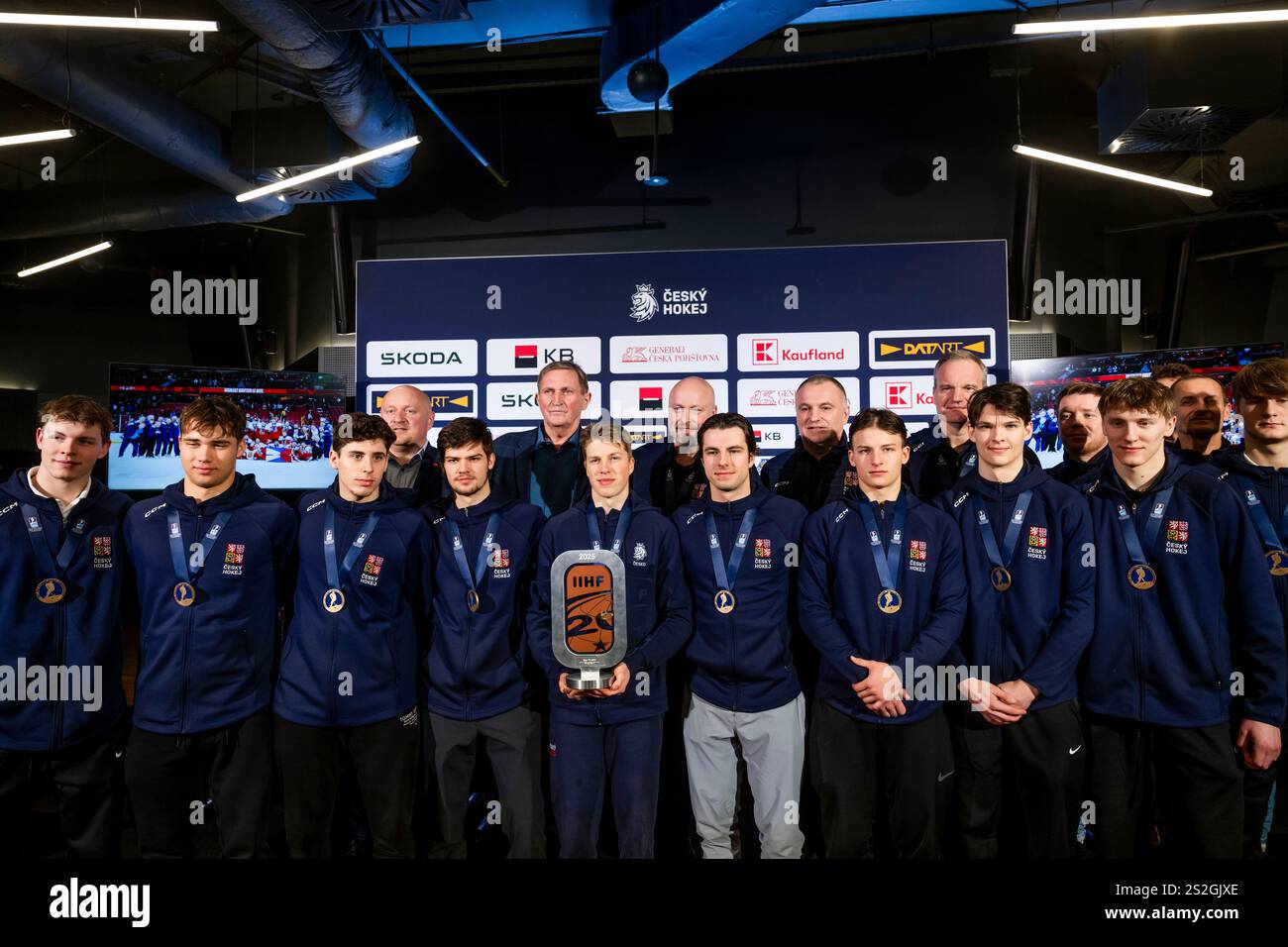 The Czech national junior hockey team poses with their bronze medals