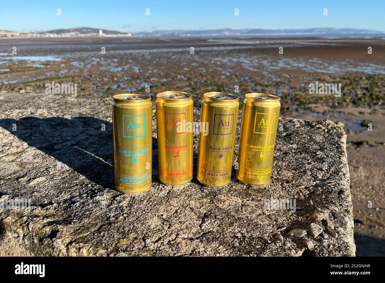 A selection of 330ml Au Vodka Pre-Mixed Cans, including Blue Raspberry, Cherryade, Black Grape, and Pineapple Crush. - Smartphone Captured Stock Image