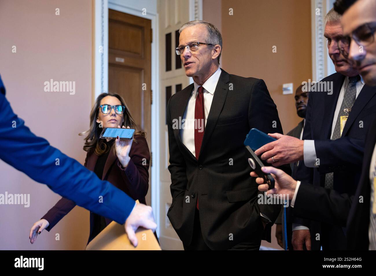Senate Majority Leader John Thune (RS.D.) speaks with reporter as he