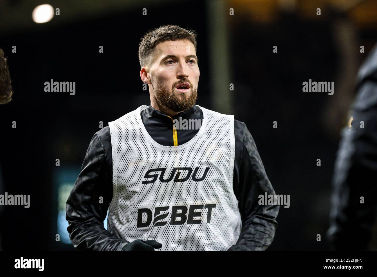 Wolverhampton, England, January 6th 2025: Matt Doherty (2 Wolves) warms ...
