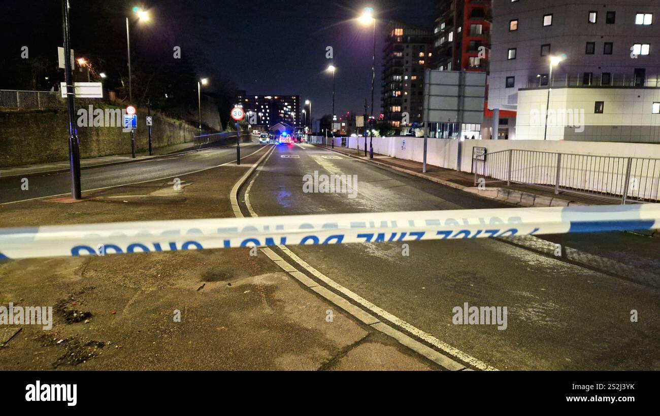 Police tape at the scene in Woolwich, south east London where a 14year