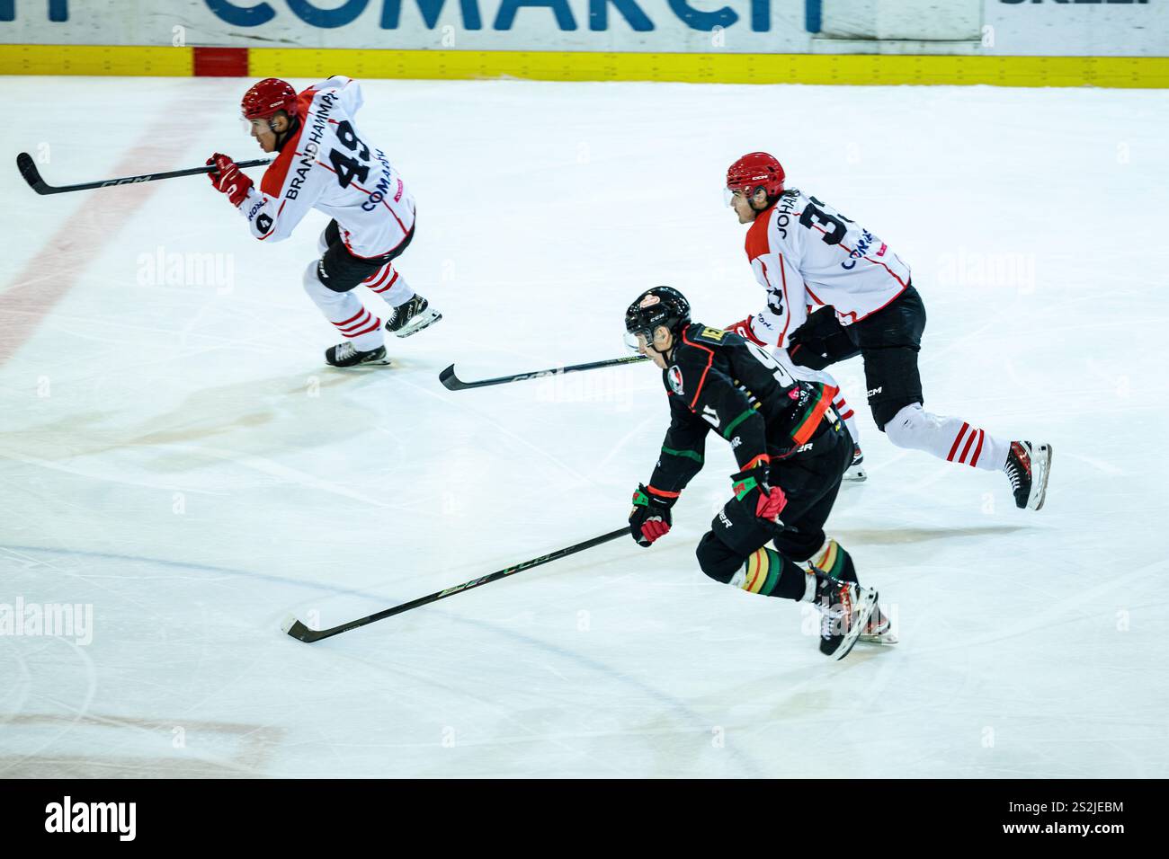 Krakow, Poland, 5th Jan 2025, A hockey match between Comarch Cracovia and GKS Tychy, OP:  Anton Brandhammar, Bartlomiej Jeziorski, Hannes Johannsson Stock Photo