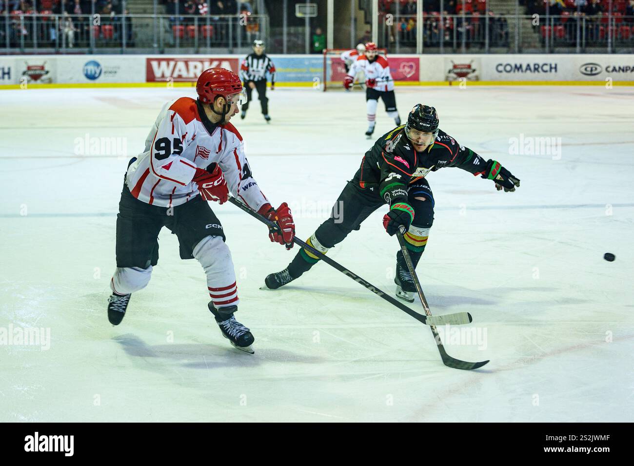 Krakow, Poland, 5th Jan 2025, A hockey match between Comarch Cracovia and GKS Tychy, OP:  Damian Kapica, Mark Viitanen Stock Photo