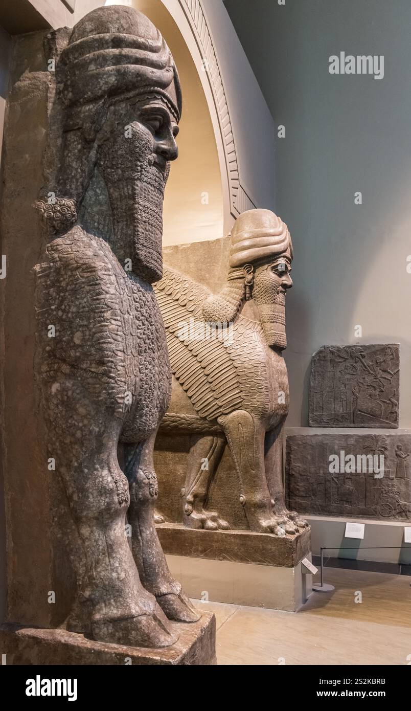 Carving of winged human-headed bull from Nimrud in the British Museum, Bloomsbury, London, Greater London Stock Photo
