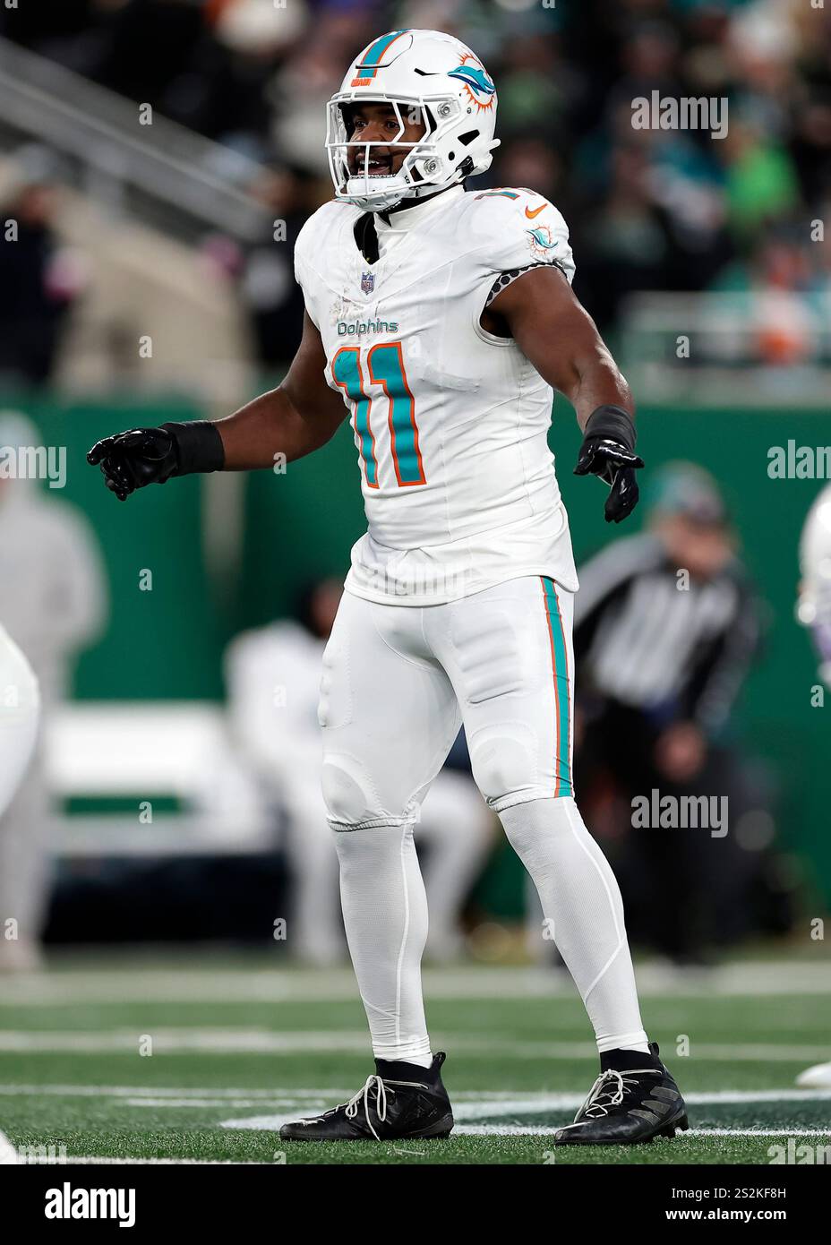 Miami Dolphins linebacker Tyrel Dodson (11) defends during an NFL