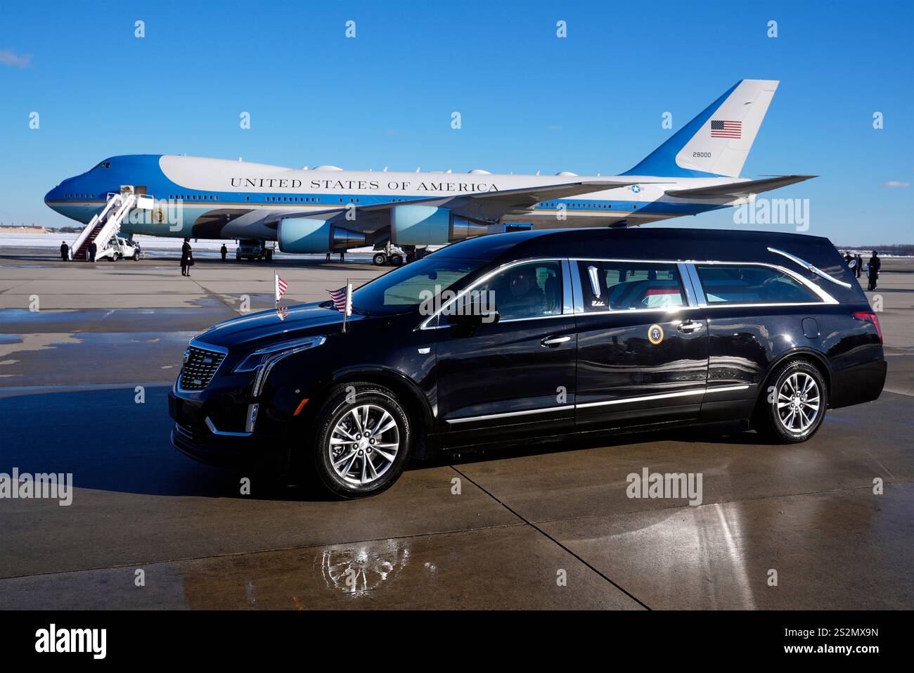 The hearse carrying the flagdraped casket of former President Jimmy