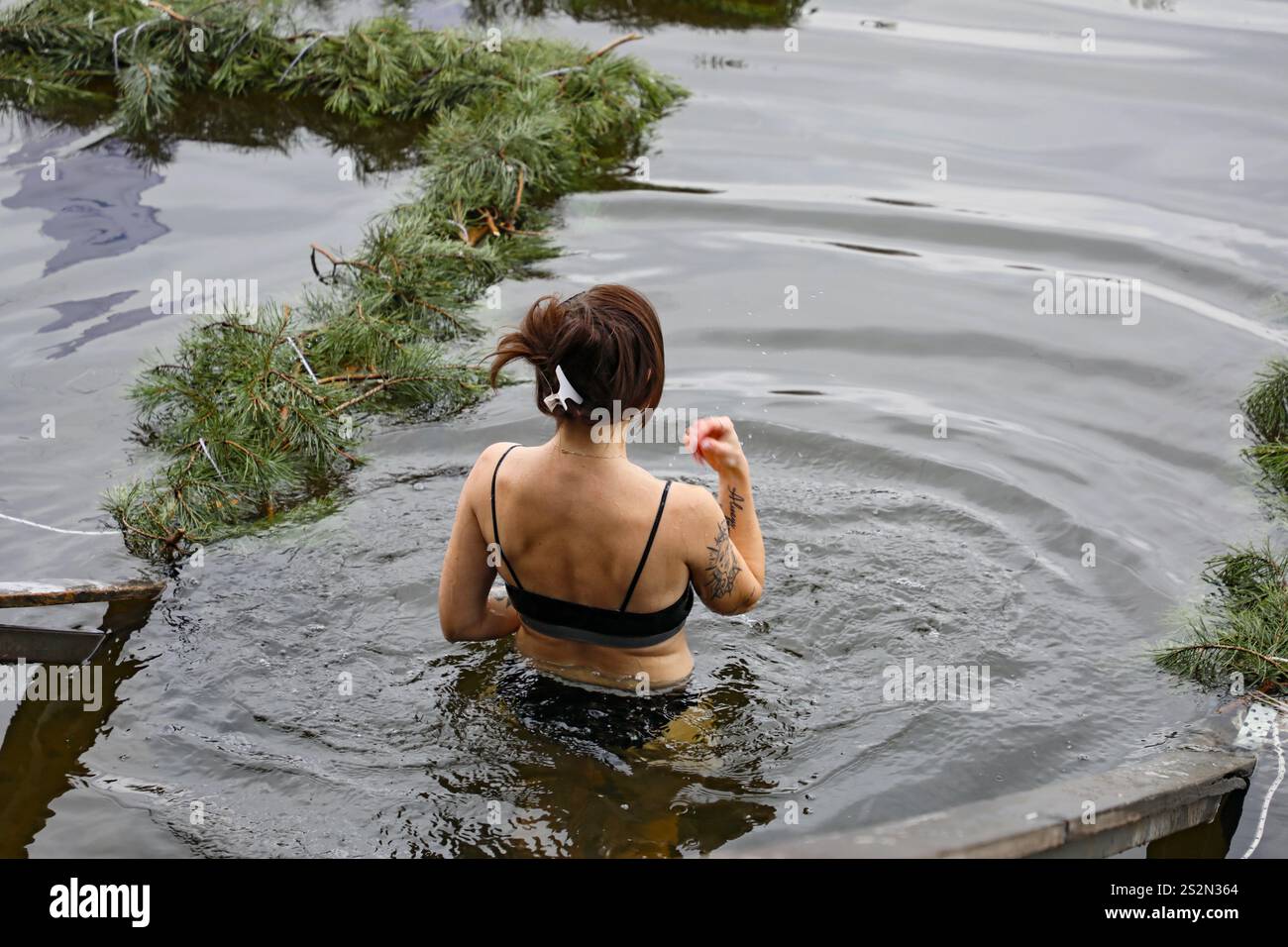 Woman bathing herself hi-res stock photography and images