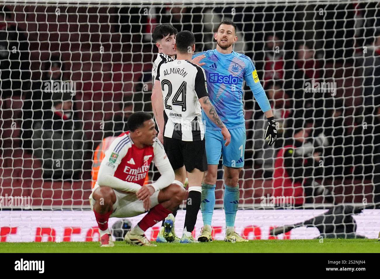 Newcastle United goalkeeper Martin Dubravka (right) and teammates