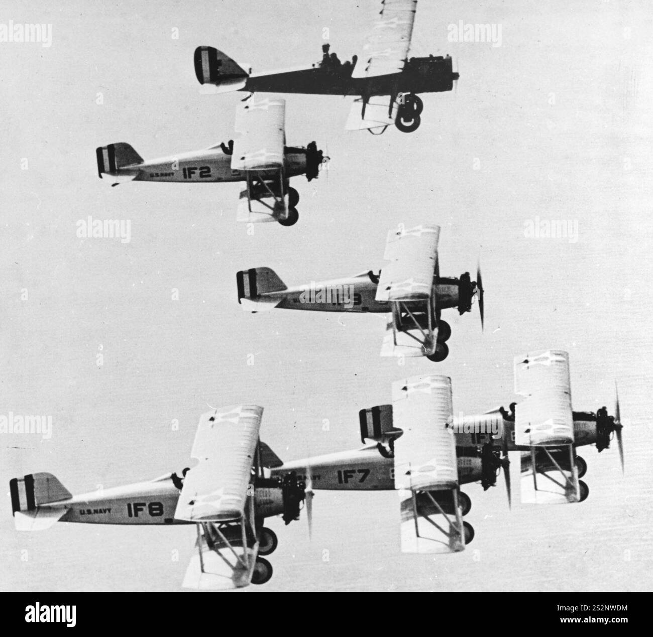 Five Naval Aircraft Factory TS-1 of VF-1 and a single DH-4B in flight ...