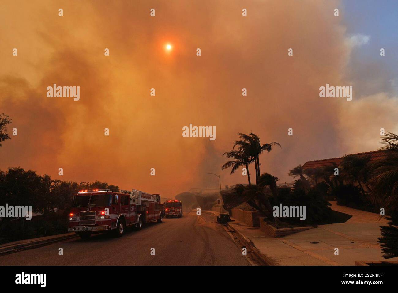 Smoke from the Palisades Fire fills the air in the Pacific Palisades