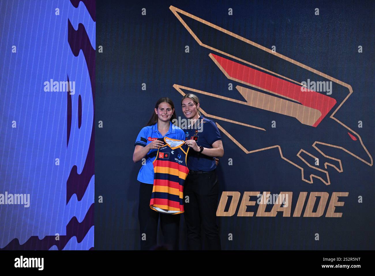 India Rasheed (left) is presented with a Adelaide Crows Guernsey on ...