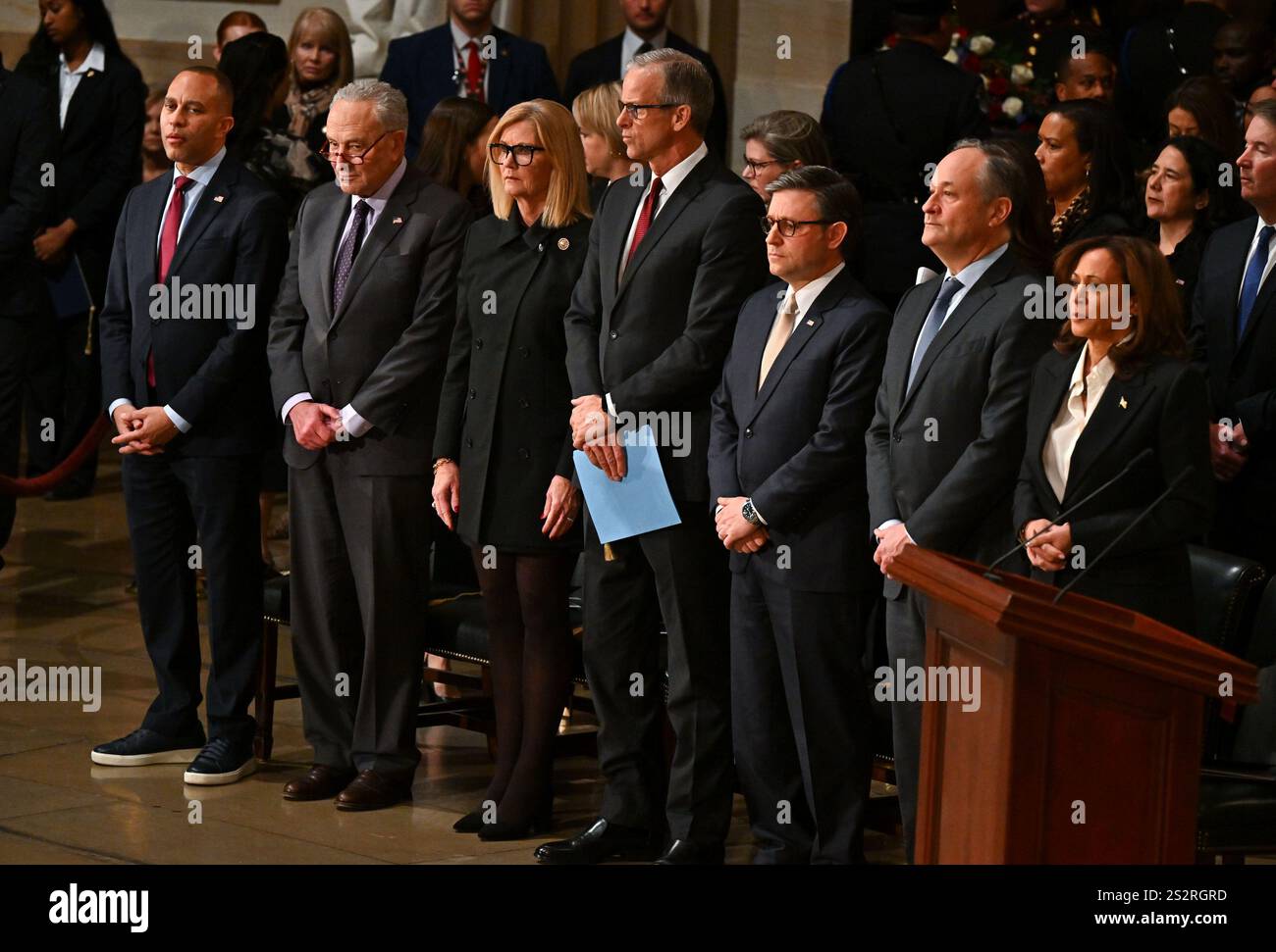 From left, House Minority Leader Hakeem Jeffries (D-NY), Senate Democratic leader Chuck Schumer (D-NY), Kimberley Thune, Senate Majority Leader John Thune (R-SD), House Speaker Mike Johnson (R-La.), second gentleman Doug Emhoff and and Vice President Kamala Harris attend a lying in state ceremony for former President Jimmy Carter at the US Capitol Rotunda in Washington, DC on Tuesday, January 7, 2025. Carter, the 39th president, died at the age of 100 on December 29 at his home in Plains, Georgia. Pool photo by Ricky Carioti/UPI Stock Photo