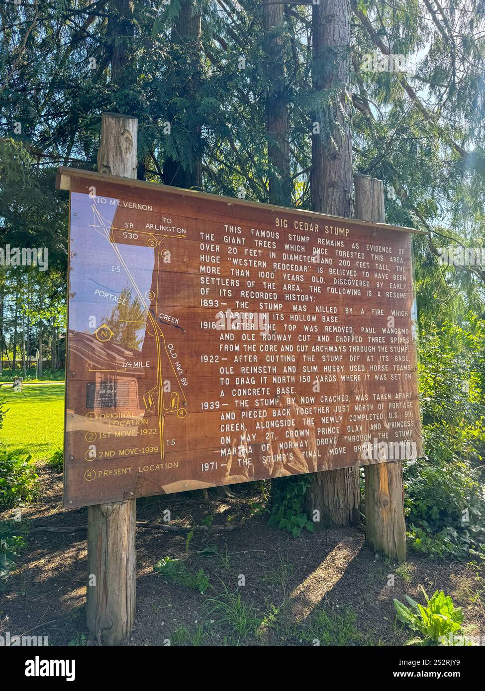 You can find the Giant Cedar Stump at the Smokey Point Rest Stop on Interstate 5 in Washington State. - Smartphone Captured Stock Image