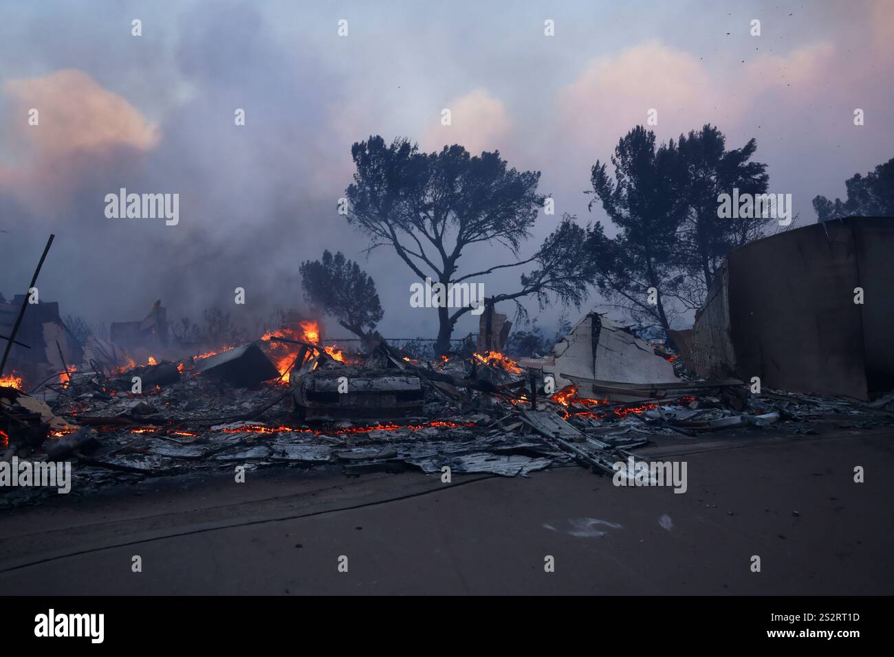 A fireravaged property smolder after the Palisades Fire swept through